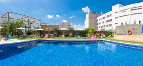 Outdoor pool, open 10:00 AM to 9:00 PM, pool umbrellas, sun loungers