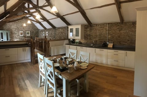 Kitchen and Dining area with wireless phone charger and USB port.