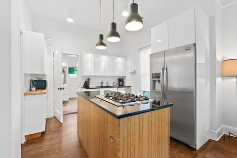 Beautiful kitchen equipped with all the basics you need for preparing in house meals during your stay!