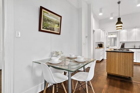 Dining opens into the gorgeous. custom kitchen