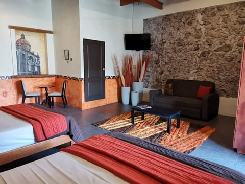 Family Room | Premium bedding, down comforters, individually furnished