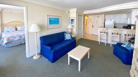 Luxury Studio Suite, 1 Bedroom, Kitchen, Ocean View | Living area | 42-inch TV with cable channels