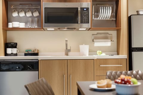 Microwave, coffee/tea maker, dining tables