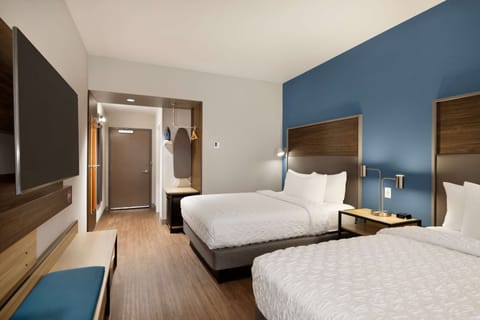 Desk, laptop workspace, blackout drapes, iron/ironing board