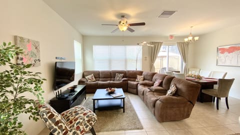 Relax in the cozy living room with a smart TV, perfect for unwinding