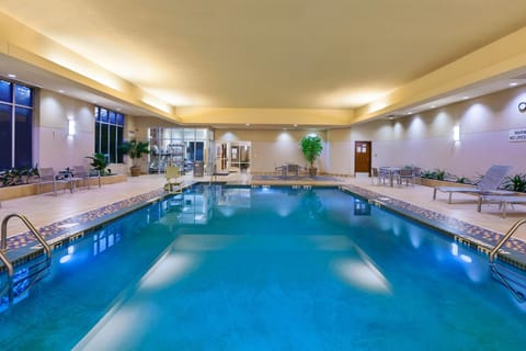 Indoor pool, open 6:00 AM to 10:00 PM, sun loungers