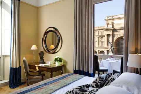 Premium bedding, down comforters, pillowtop beds, minibar