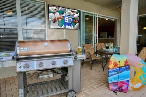 50" TV, 4 Burner Webber Grill Poolside.