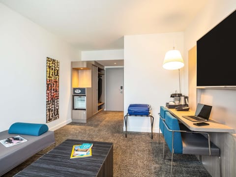 Hypo-allergenic bedding, free minibar items, in-room safe, desk