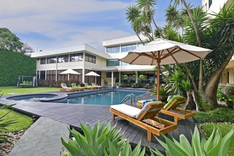 Outdoor pool, open 9:00 AM to 9 PM, free cabanas, sun loungers
