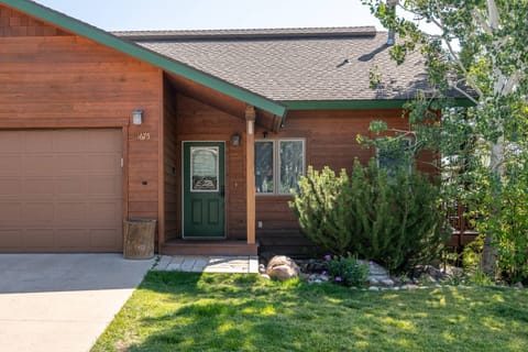 Welcome to your mountain retreat—private front entrance with attached garage for easy access and convenience.
