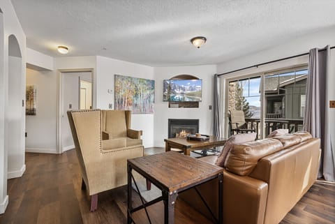Spacious Living Room with fireplace, TV, and Sleeper Sofa
