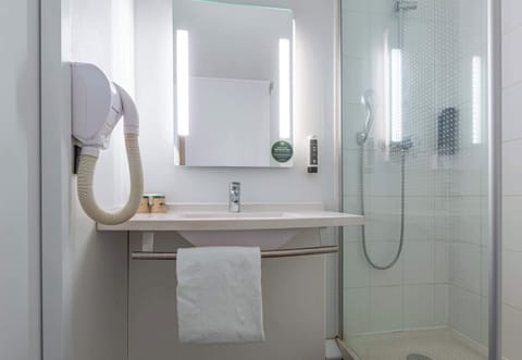 Shower, free toiletries, hair dryer, towels