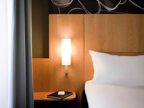 Desk, laptop workspace, blackout drapes, soundproofing