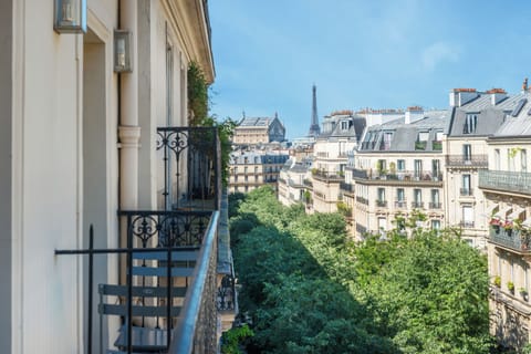 Eiffel Tower View Room - Complimentary soft minibar,courtesy tray, Chromecast and digital press | Minibar, in-room safe, desk, blackout drapes