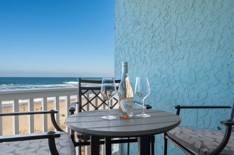 Drink a glass of wine on the beach!