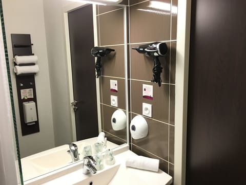 Shower, eco-friendly toiletries, hair dryer, towels