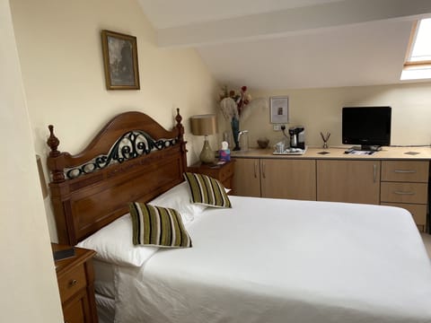 Main double bed next to door