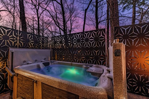 Ease into your bubbling hot tub as the sun sets over the Smoky Mountains,