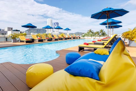 Outdoor pool, open 6:00 AM to 8 PM, pool umbrellas, sun loungers