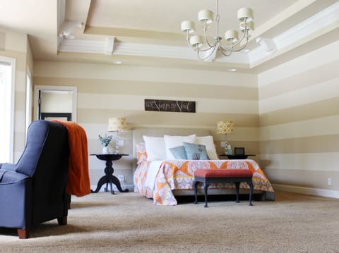 LARGE BEDROOM #1... with 2 reclining chairs overlooking pool & backyard! 