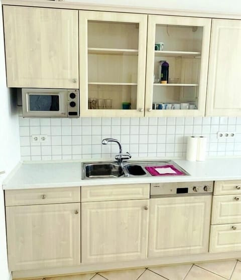 Fridge, stovetop, coffee/tea maker, cookware/dishes/utensils