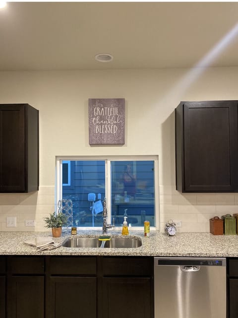 Kitchen area with Brand New Stainless Steel Appliances 