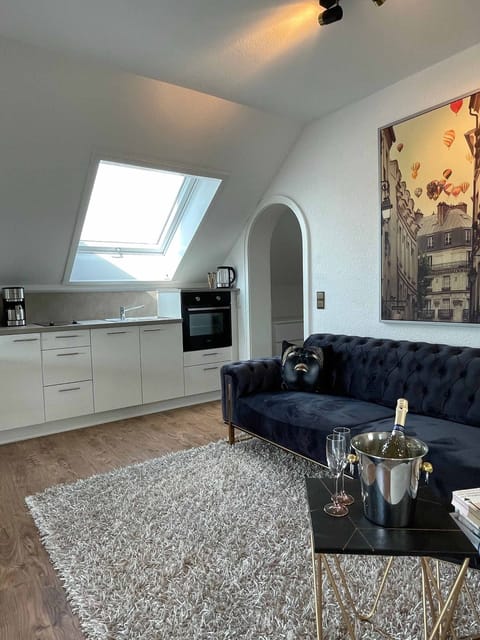 Studio | Living area | 42-inch TV with satellite channels