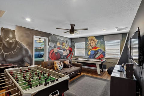 Welcome To Coastal Vibes At ChampionsGate!  Fun Game Room!