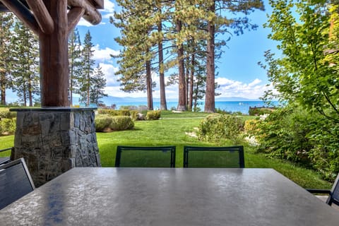 Your lakeside terrace offers breathtaking water views through towering pines—perfect for morning coffee or evening meals.