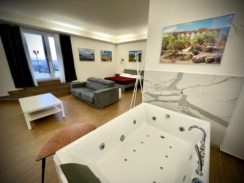 Panoramic Studio Suite, Jetted Tub, Sea View | Desk, laptop workspace, blackout drapes, iron/ironing board