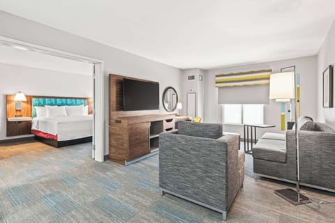 Suite, 1 King Bed, Non Smoking | Living area | 55-inch LCD TV with cable channels, TV, Netflix