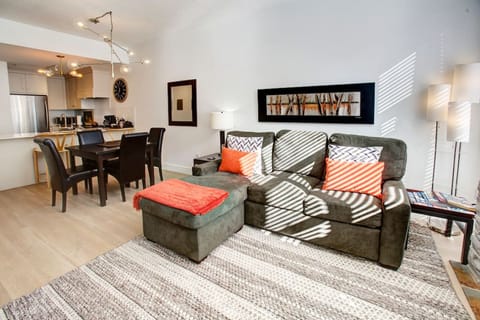 NEW TOP TO BOTTOM RENOVATION!!! Comfortable Living Room with a plush mattress pull out bed, large Screen TV with cable and Netflix, Gas Fireplace, Private Patio and Access to Year Round Heated Pool and hot tubs!