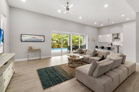 The living room with its ample seating is a great place for the family to gather and (re)connect