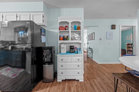 Fully stocked coffee and tea area with K Cups, ground coffee, oatmeal, and more