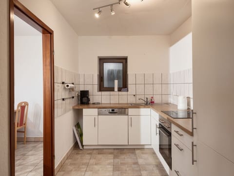 Cabinetry, Sink, Countertop, Property, Furniture, Tap, Kitchen Sink, Wood, Ceiling Fan, Lighting