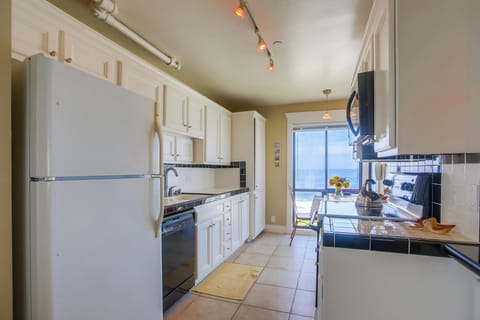 Features a galley kitchen.