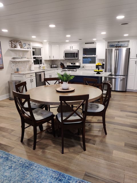 Seating for 10 in the kitchen/dining room. Six at the table, four at the island.