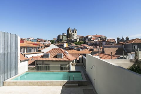 Indoor pool, outdoor pool, pool umbrellas, sun loungers