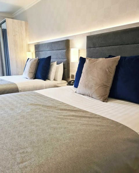 Twin Room | Premium bedding, desk, blackout drapes, iron/ironing board