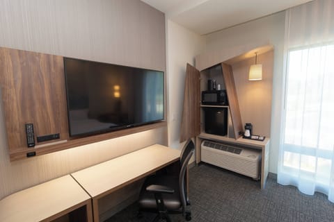 Desk, laptop workspace, blackout drapes, iron/ironing board