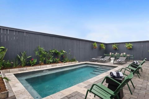 Shared Outdoor Area | Seasonal Heated Pool | Poolside Seating | Shared with Other Units in Building