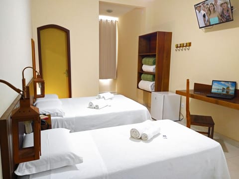 Comfort Quadruple Room | Minibar, individually furnished, desk, laptop workspace