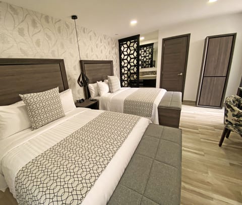 Deluxe Double Room (Suite Narvarte) | Premium bedding, down comforters, in-room safe, laptop workspace