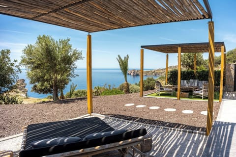 A pergola with sunbeds offers amazing views!