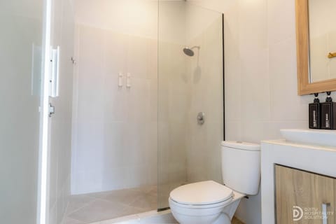 Shower, towels, soap, shampoo