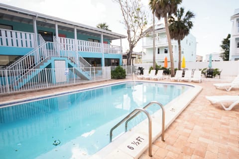 Welcome to Sunburst Vacation Rentals!  Feel free to use our BBQ to make your stay even more fun (and delicious)- everyone loves hamburgers and hotdogs  under the patio umbrella set while also enjoying the pool, which is heated by the SUN!