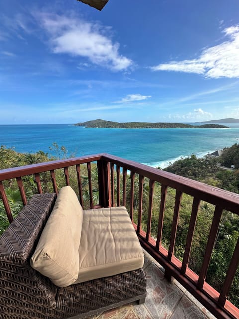 Deck overlooking the Ocean.  Imagine bathing in the glow a  beautiful Sunrise
