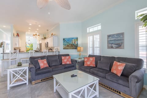 Charming coastal decor surrounds you in every inch of the home, providing a tropical escape!