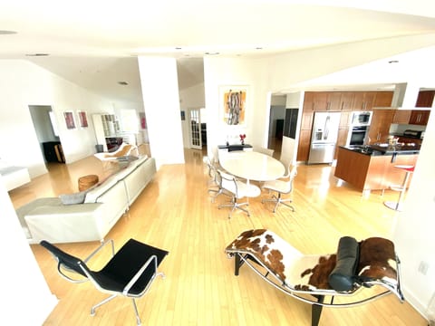 Dining room ; breakfast bar&coffee station to right ; private office in the back